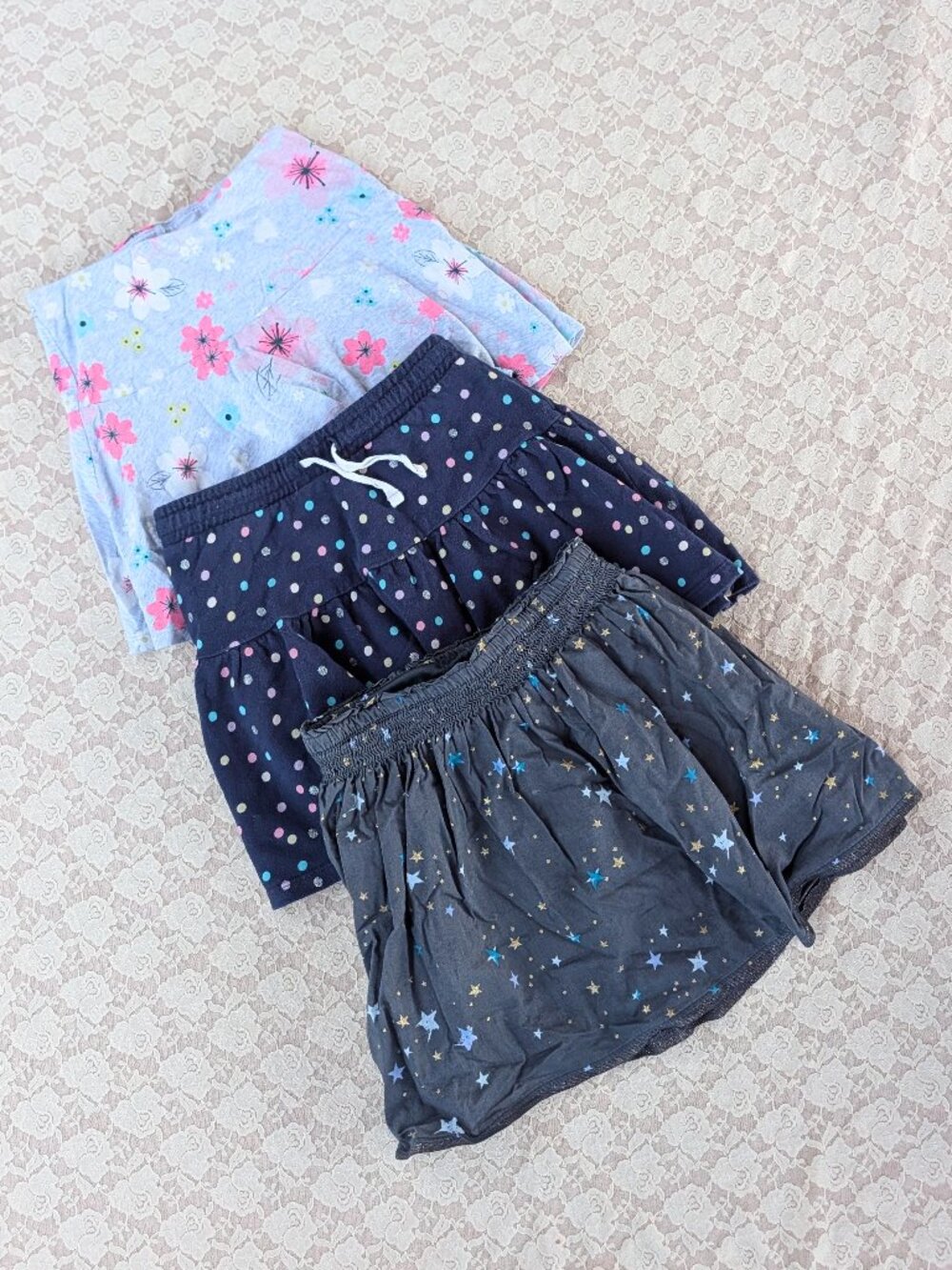 Lot of 3 girls skorts sizes 7 and 7-8, GUC floral stars polka dots 100 cotton
